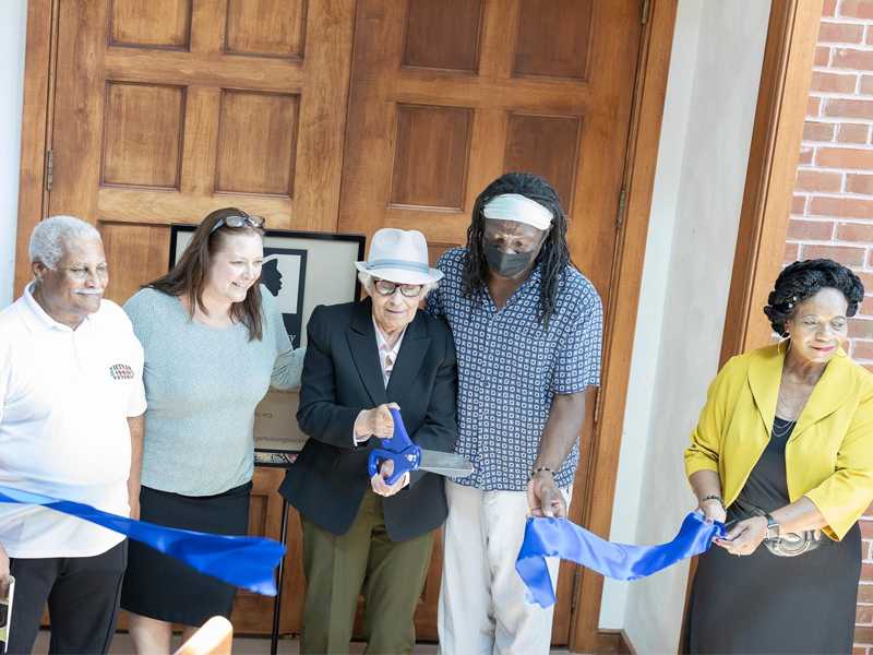 Members of the Gettysburg Black History Museum board of directors, including Mary Alice Nutter, center, cut the ribbon at the museum's new location within Valentine Hall on the United Lutheran Seminary campus in Gettysburg. The museum is open by appointment only.