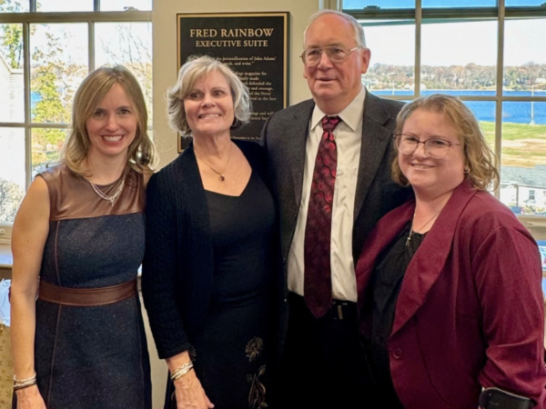 Frederick Schultz stands with his family in Annapolis.