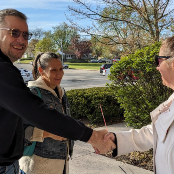 beth farnham greets voters