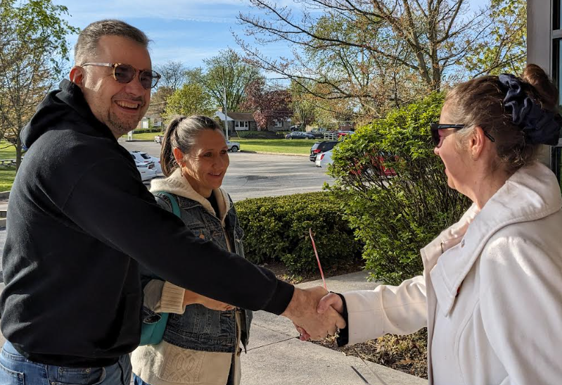 beth farnham greets voters