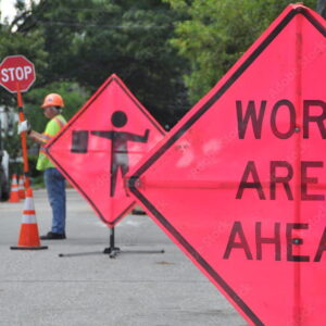 Construction Work Sign, Flaggers and Cones