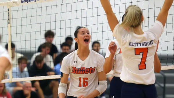 Gettysburg volleyball player Clare Farrell celebrates during a match