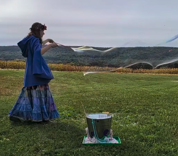 Professional character actor Jillian Breneman prepares for Halloween bubble-making activities ahead of the Adams County Farmers Market’s Halloween Spooktacular.